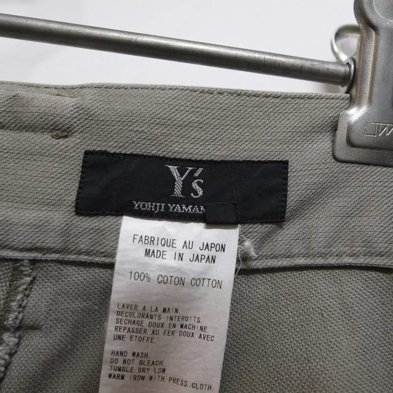 flap pocket cuffed trousers