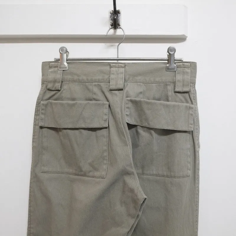 flap pocket cuffed trousers