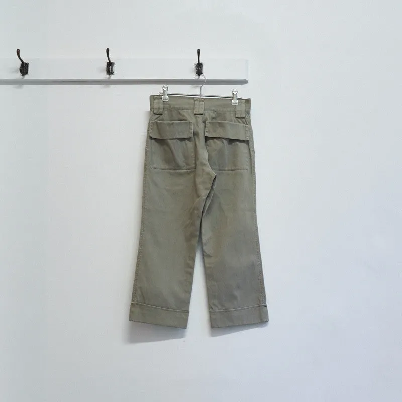flap pocket cuffed trousers